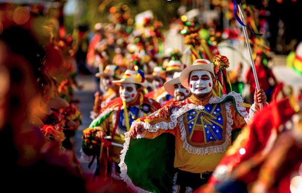 Dancers in colorful costumes at the Carnival of Barranquilla